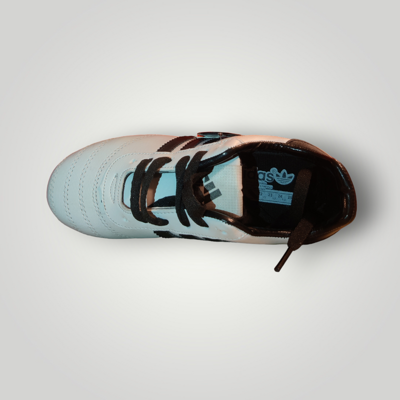 Tachones de Futbol Pasto Natural Modelo COPA MUNDIAL Color Blanco con Negro Tallas del 25 al 28.5 Mx